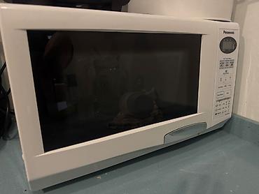 panasonic mikrodalgali soba: Panasonic mikrodalğalı soba - Ön paneldə LCD ekran və idarəetmə — 1