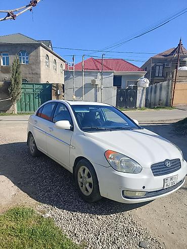 aksent: Hyundai Accent: 1.6 l | 2009 il Sedan — 2
