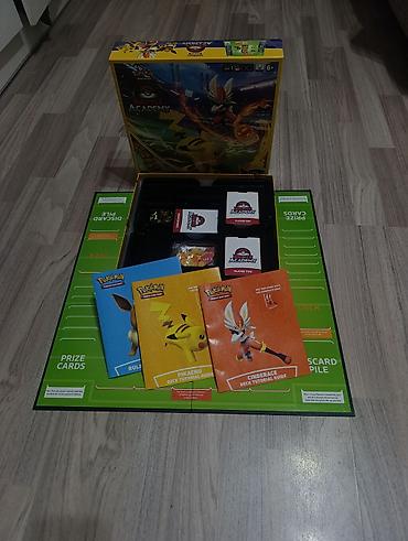 текен: Лот Pokémon TCG + Dobble и фигурка Miniso. Все товары в лоте являются — 2