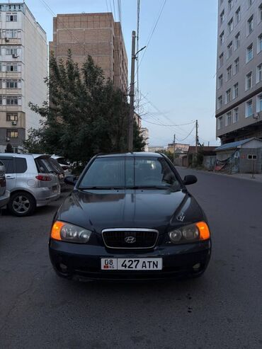хундай элентра 2003: Черный седан Hyundai Elantra с автоматической коробкой передач