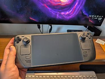 купить steam deck: Портативная игровая консоль Valve Steam Deck OLED 512 полный комплект+ — 1