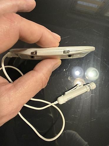 плеер для музыки: Портативный CD-плеер Sony CD Walkman D-NE20 с пультом ДУ на проводе — 5