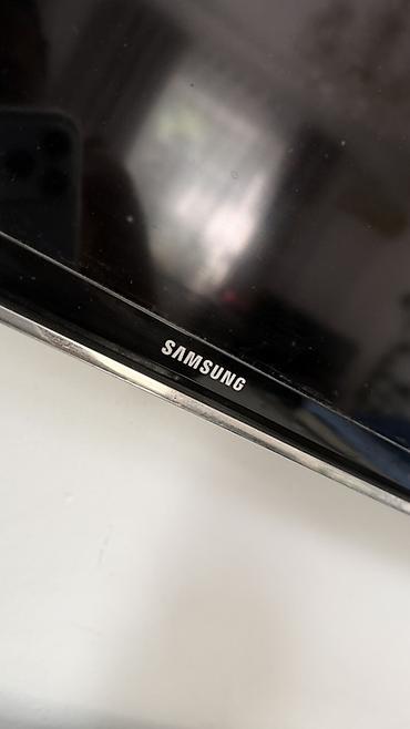 infinix note 60: Телевизор Samsung с большим тонким экраном (диагональ ориентировочно — 4