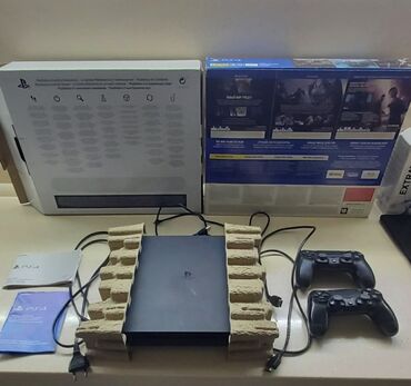 playstation 4 icaresi: PS 4 slim 1 tb 2 orjinal dualshock ilə yeni kimidir. İçində gta 5