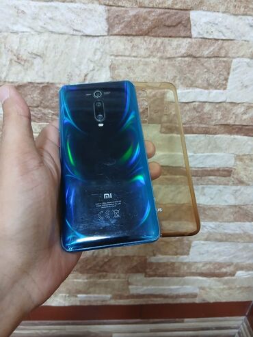 Xiaomi Mi 9T, 64 ГБ, цвет - Синий, 
 Отпечаток пальца
