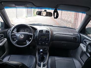 mazda 2000: Mazda 323: 2002 г., 1.6 л, Механика, Бензин, Хэтчбэк — 5