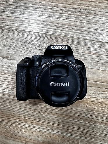 canon 650: Canon 650 D 50 mm Lens dir üstündə. 32 gb kart. Ötürücü hədiyyə - — 3