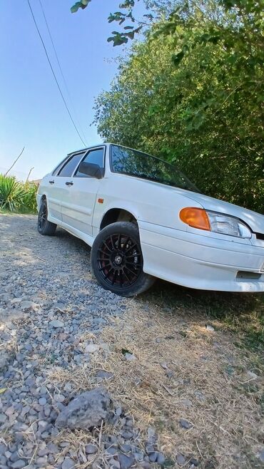 авто ру азербайджан: Lada 2115 avtomobili, dörd qapılı sedan kuzov tipinə malikdir. Ağ