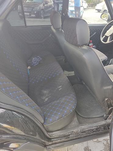 Tofas: Model: Tofaş Şahin (sedan) Rəng: Qara Kuzov: 4 qapı, arxa ötürücü — 8
