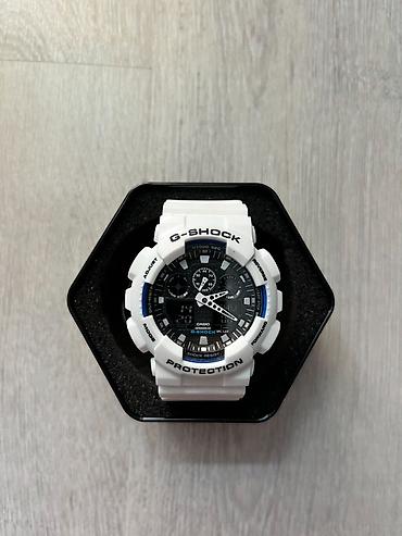 romanson satovi cena: Casio G-Shock ručni sat u beloj boji, sa prepoznatljivim robusnim — 1