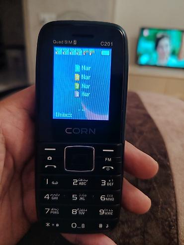 CORN C201 düyməli telefon 4 nomreli yaxsi zaryatqa saxlayir