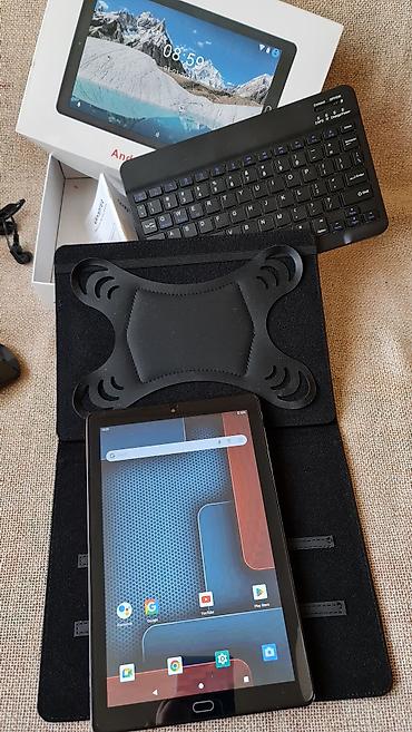 Tableti: GOODTEL Android tablet – komplet sa dodatnom opremom Opis: - Tablet — 2