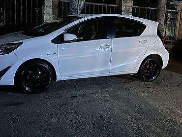 5 1: Toyota Aqua: 1.5 l | 2018 il — 2