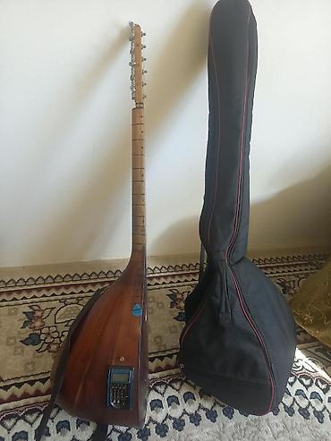 korq pa 80: Milli saz satılır. Alət ənənəvi saz formasında hazırlanıb, tünd — 4