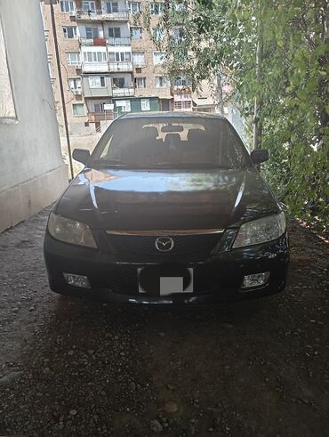 продаю в связи с переездом: Mazda 323: 2002 г., 1.6 л, Автомат, Бензин, Хэтчбэк