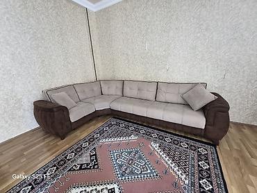 Künc divan – L şəklində, yumşaq oturacaqlı və geniş yatma funksiyalı