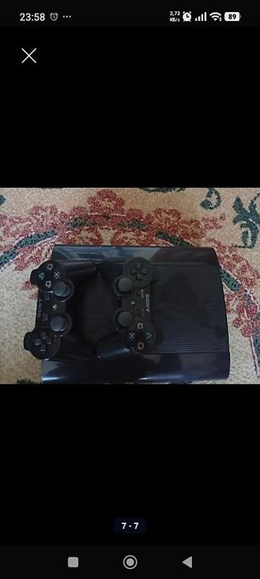 рии: Игровая приставка Sony PlayStation 3 Super Slim с двумя беспроводными — 2