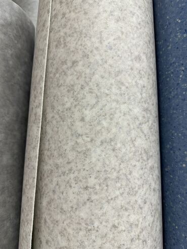 Линолеум: Рулон линолеума с мелкодисперсным узором. Представлен в нескольких — 4