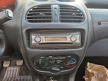 pragovi za auto: KLIMATRONIK RADIO DISPLEJ ZA PEUGEOT 206 — 2