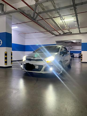 4 ayaq: Kia Rio: 1.4 l | 2013 il Sedan — 4
