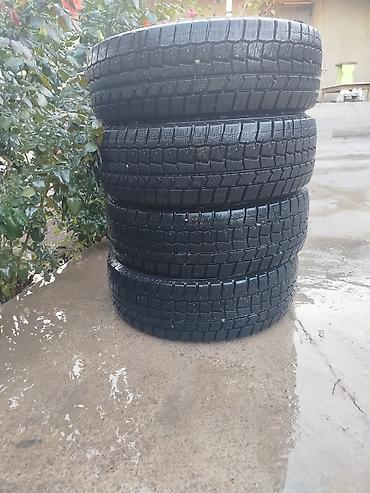 Шины: Комплект зимних шин Dunlop - Размер: 185/60 R15 (указано на боковине) — 2