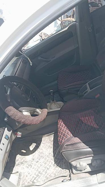 opel astra gtc: Daewoo Lacetti, седан, белый цвет. машина на разборе — 3