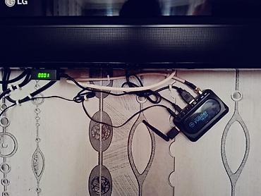 wifi adapteri: LG divar tipli televizor + Yupiter TV qutusu (IP/OTT set-top box) — 2
