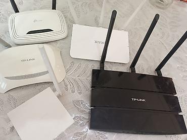 ucuz wifi modem: Wi‑Fi routerlər toplusu Brendlər: TP‑Link və Tenda. Korpusda müxtəlif — 2