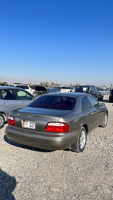 футляр для кия: Mazda Capella: 2001 г., 2 л, Автомат, Бензин, Седан — 4