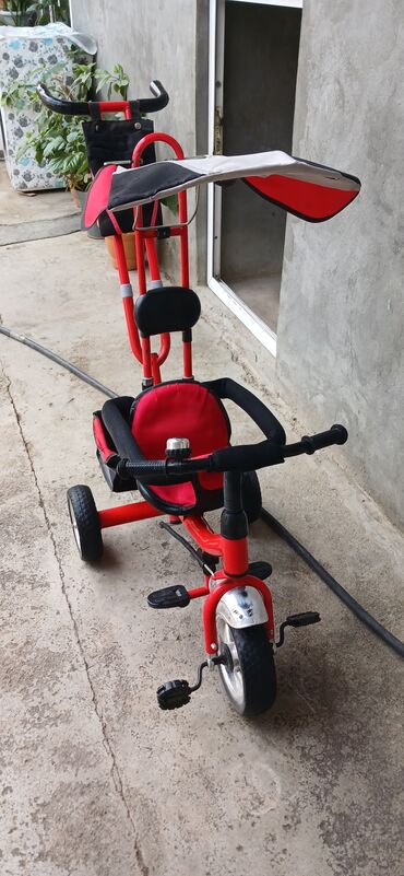 uşaq cadırı: 0507137509Bu qırmızı rəngli uşaq üçtəkərli velosipedi balacalar üçün