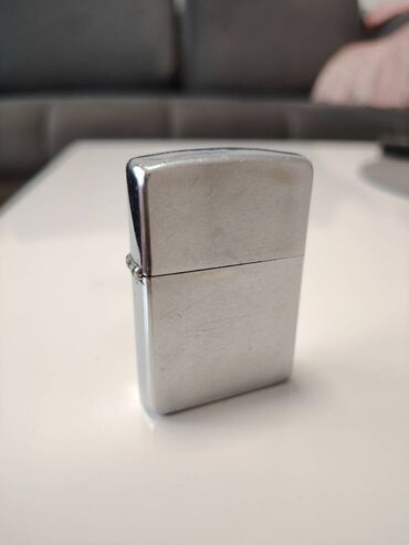 duge haljine novi sad: Zippo lighter, Used