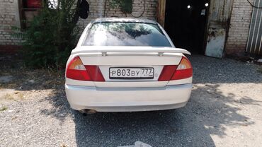дом на кол: Mitsubishi Lancer: 1999 г., Седан