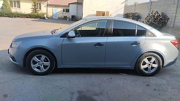 mazda 3 2006: Chevrolet Cruze: 2009 г., 1.6 л, Механика, Газ, Седан — 2