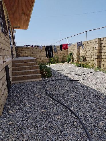 28 may metro: MEHDİABAD Nurlan marketin yanı. İki sotda üç otaqlı remontlu, kolidor — 2