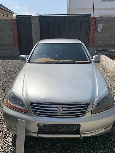 митсубиси спайк стар: Toyota Mark II: 2003 г., Автомат, Седан — 1
