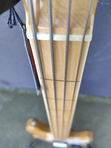 Gitare: SIRE MARCUS MILLER V7 SWAMP ASH 4-STRING FRETLESS B-STOCK | Slanje — 6