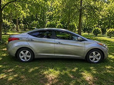 фольксваген пассат 1: Hyundai Elantra: 1.8 л | 2013 г. Седан — 3