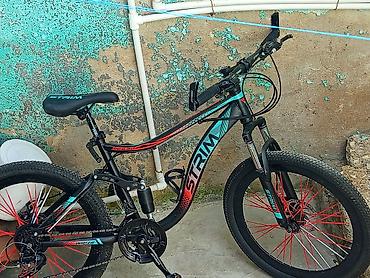 Dağ velosipedləri: STRIM dağ velosipedi - Model: STRIM XC650 (gövdə üzərində qeyd) - — 2