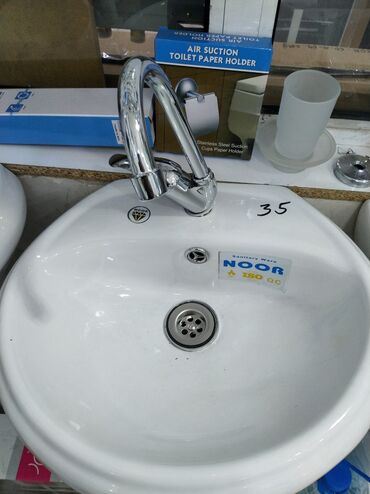 тюльпан: Ağ rəngli, keramika materialdan hazırlanmış hamam otağı çanağı. Çanaq