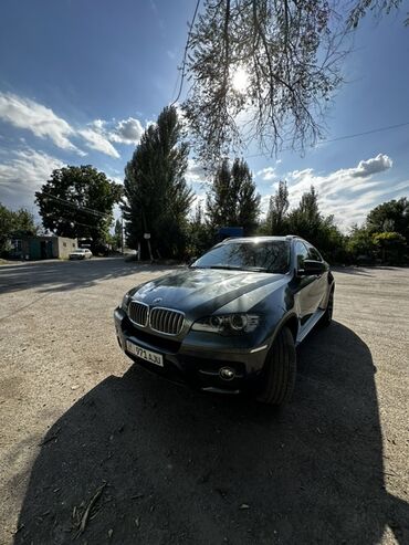ош мерс: Автомобиль BMW X6 в кузове внедорожника, окрашенный в тёмно-зелёный