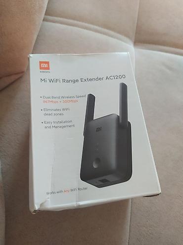 xiomi modem: Xiaomi Mi WiFi Range Extender AC1200 - İki zolaqlı (Dual-Band) sürət — 1