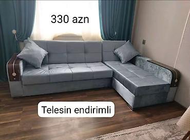saloglu mebel: Künc divan – toxuması yumşaq, boz/rəngli parça üzlüklə. L‑şəkilli — 1