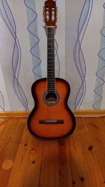 gitar: Tep tezedir,endirim olunacag