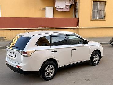 Mitsubishi: Mitsubishi Outlander – ağ rəngli, şəhər və uzun yol üçün rahat və — 13