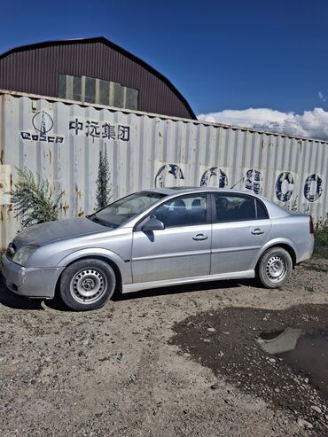 головка блока цилиндров опель вектра б: Серебристый седан Opel Vectra, оснащенный четырьмя дверями