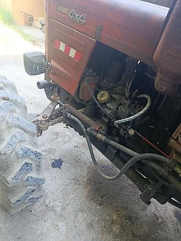 борт на: Трактор полноприводный 4x4, кабина закрытого типа. Характеристики и — 4