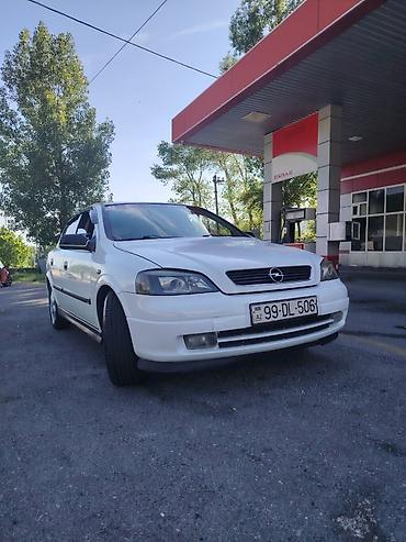 195 50 15: Opel Astra: 1.6 l | 2000 il 111222 km Sedan — 1