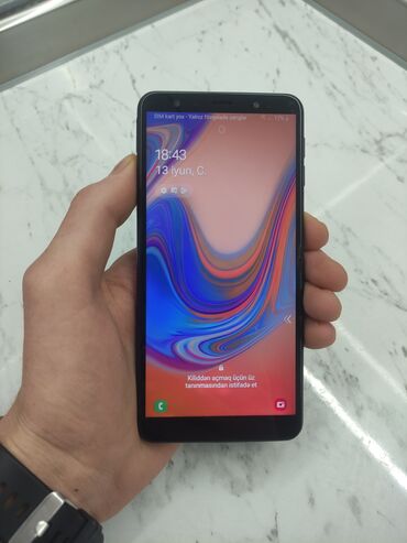 сотовый телефон флай: Samsung Galaxy A7 2018, 64 ГБ, цвет - Черный