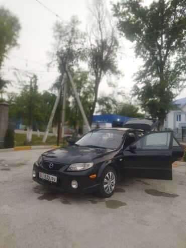 продаю аварийных авто: Mazda 323: 2001 г., 1.6 л, Механика, Газ, Хэтчбэк