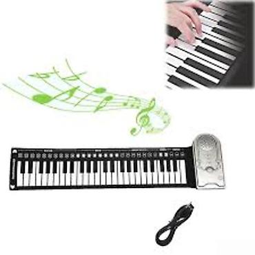 sintezator satışı: Qatlanan pianoQatlanan Piano 49 klavis Təsvir : Qatlanan Piano 49 — 1